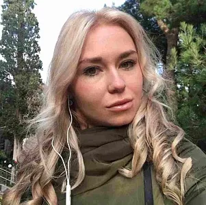 Оля